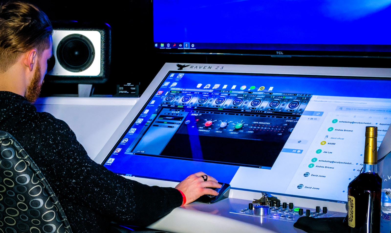 person in black long sleeve shirt playing game on computer